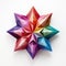 A multicolored origami star on a white surface