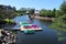 Multicolored Paddle Boats on a Lake