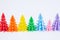 Multicolored paper Christmas tree white background