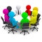 Multicolored people sitting at a round table