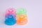 Multicolored plastic bobbin for sewing machine layed in rows in