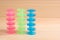 Multicolored plastic bobbin for sewing machine layed in rows in