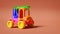 Multicolored plastic toy truck on orange background