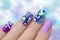 Multicolored purple blue manicure.