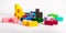 Multicolored puzzle toy elements. Chaos, disorder, work beginning concept. Wooden kids game for logical thinking