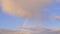 Multicolored rainbow and clouds in the sky after the rain, abstraction, blurred