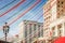 Multicolored ribbons and festive garlands hang on the background of the hotel on Manezh Square.