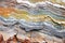 multicolored sedimentary rock layers closeup