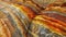 Multicolored sedimentary rock layers. Macro shot of geological formation