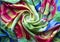 Multicolored silk. Painted natural satin. Batik. A scarf made of silk fibers.