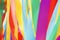 Multicolored silk ribbons are heard in the wind. Background image