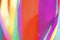 Multicolored silk ribbons are heard in the wind. Background image.