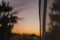 Multicolored sky at sunset and a curtain in a farm