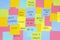 Multicolored sticky paper notes with various messages