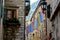 Multicolored towels hang on a rope in the street of the old town of Kotor, Montenegro