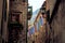 Multicolored towels hang on a rope in the street of the old town of Kotor, Montenegro