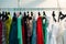 Multicolored womens clothing hanging on the hanger horizontal