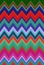 Multicolored zigzag rainbow wave pattern. texture woven