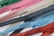 Multicolored zippers textile industry concept. Sewing objects closeup