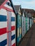 Multicoloured beach huts on the Suffolk coast