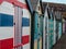 Multicoloured beach huts on the Suffolk coast