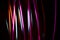 Multicoloured bright neon abstract for backgrounds Lights in motion on black background
