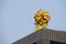 Multicoloured colourful Balloon decoration in the top of building