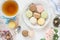 Multicoloured macaroons and tea