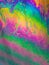 Multicolours as light refracts through liquid soap