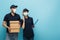 multicultural couriers in medical masks, with