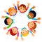 Multicultural Kids in a circle in the flowers with happy faces shoot from above lifting hands above. Happy Friendship