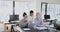 Multiethnic businesswomen using laptop engaged at teamwork in office