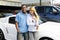 Multiethnic couple buying a new car