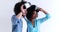 Multiethnic couple getting experience using VR headset glasses