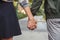 Multiethnic couple in love walk in park closeup