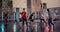 Multiethnic Diverse Group of Friends Playing Soccer on Rooftop Urban City Spot at Sunset After Rain