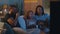 Multiethnic family watching funny movie
