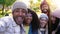 Multiethnic friends taking selfie smiling happy looking at camera having fun together.