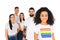 multiethnic group of young people standing behind african american woman with lgbt sign on t-shirt  isolated