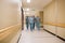 Multiethnic Medical Team Walking In Hospital