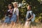 Multiethnic teens walking in park