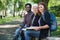 Multiethnic University Students Sitting On Campus