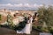 Multiethnic wedding couple. Destination fine-art wedding in Florence, Italy. A wedding ceremony on the roof of the