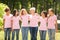 Multiethnic Women In Pink Ribbon T-Shirts Hugging Outdoor