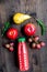 Multifruit drink in plastic bottle on wooden background top view