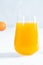 Multifruit juice in glass on white background. Orange juice.Fresh fruits.Healthy food and drink. Limons and tangerines. A