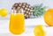 Multifruit juice in glass on white background. Orange juice.Fresh fruits.Healthy food and drink. Limons and tangerines. A