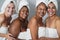 Multigeneration women with diverse skin and body having fun together while wearing body towels - Focus on african senior female