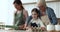 Multigenerational women and child prepare home-made pastry