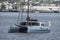 Multihull luxury sailboat Moonwave leaving New Bedford under electric power